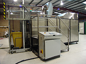 Custom bin lifter integrated into medical waste disposal unit